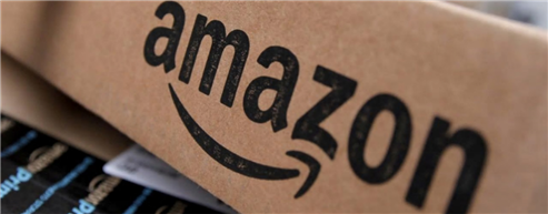 Amazon Freezes Hiring As Consumer Spending Slows 